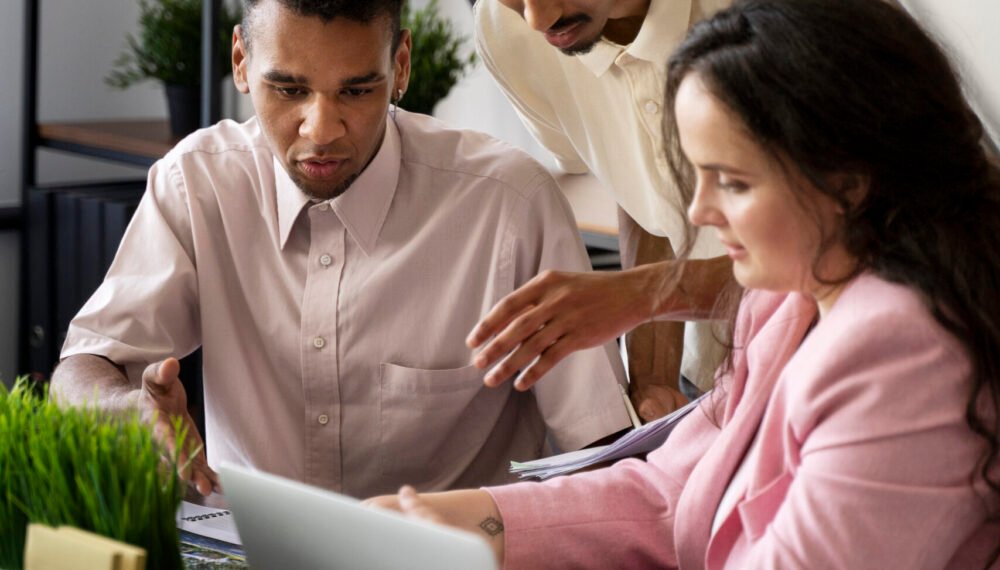 side-view-people-working-with-laptop